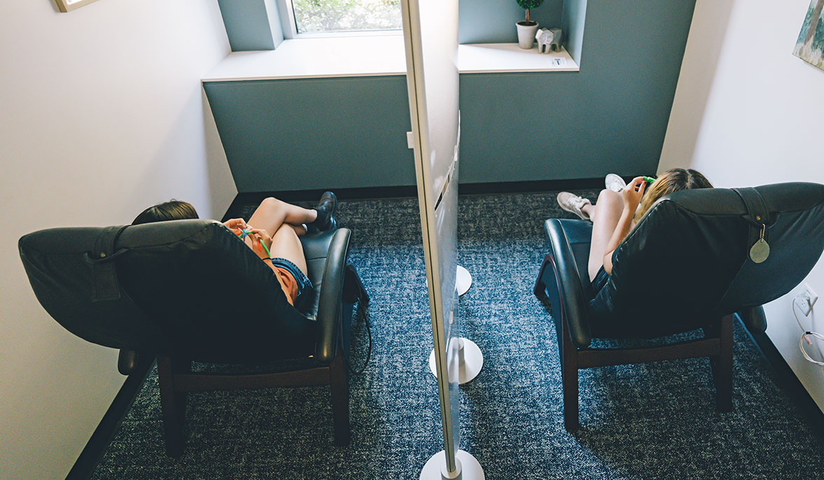 students relaxing in chairs